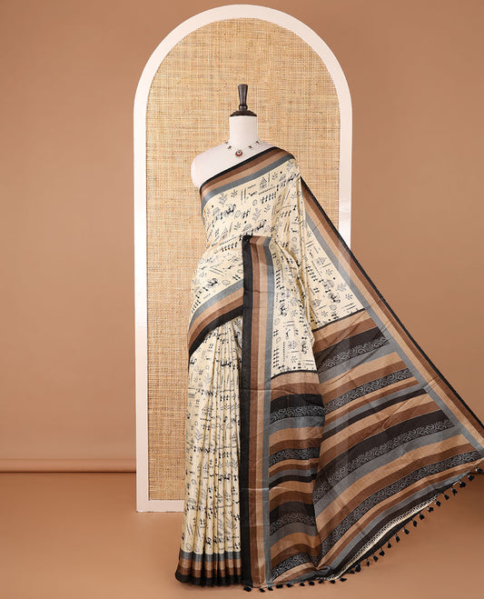 Chikku warli-village theme motifs printed khadi cotton saree, contrast multi-color border, paisley printed pallu & plain blouse