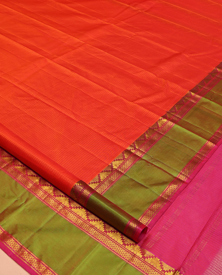 Orange Kanchipuram Silk Saree, Sparsely Woven with Vazhai Poo Stripes on Its Body, Complemented by Contrast Rettai Pettu Border of Thazampoo Rekku, and Ara Maadam Designs, Zari-Striped Pallu, and Paired with a Contrast Blouse
