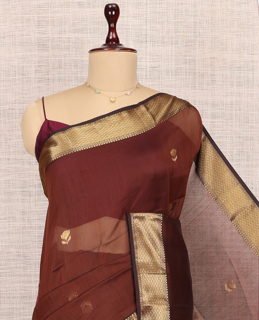 Brown Maheshwari Cotton Saree, Accentuated with Buttas, Highlighted by a Traditional Zari Border, Zari Gleamed Up Pallu, and a Matching Blouse