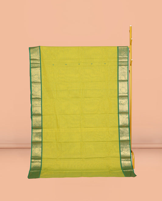 Parrot Green Chettinad Cotton Saree, Subtly Sparkled with Buttas All Over Its Body, Complemented by a Contrast Chakram Zari Design Border, Pallu of Stripes and Buttas, and Paired with a Matching Blouse