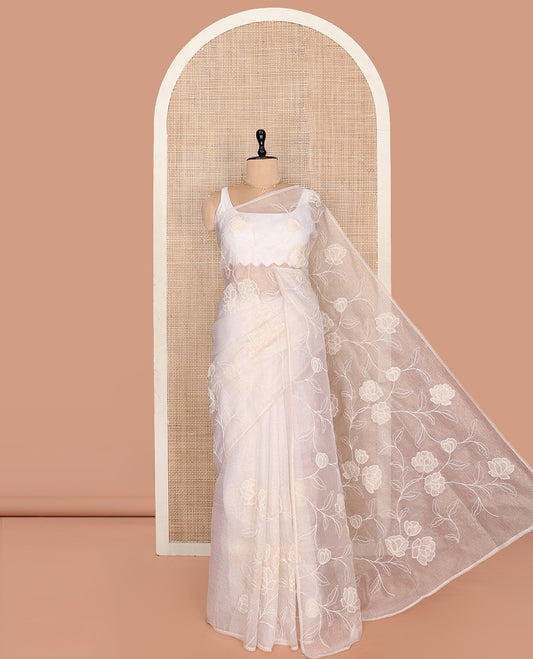 Off-white Crushed Tissue Saree, Delicately Decked Up with Floral Vine Embroidery, a Subtle Scallop Border, and Matching Blouse