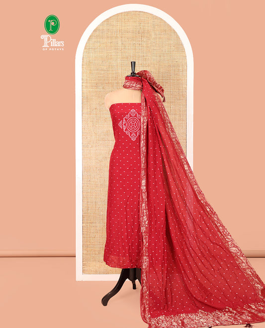 Red Mul Chanderi Material Chudidar Set, Subtly Printed with Bandhani-Style Printed Top, a Plain Santoon Bottom, and Paired with a Matching Mul Chanderi Bandhani-Dotted and Zari-Woven Dupatta