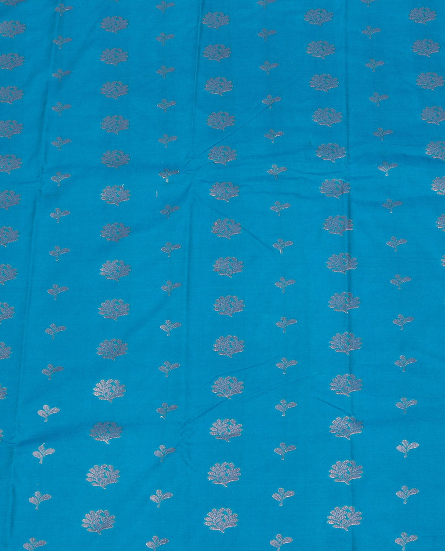 Blue Art Silk Pavadai Material Set, Woven with Floral Zari Buttas All Over Its Skirt, Highlighted with a Contrast Floral Jaal Zari Design Border, and Paired with a Contrast Blouse