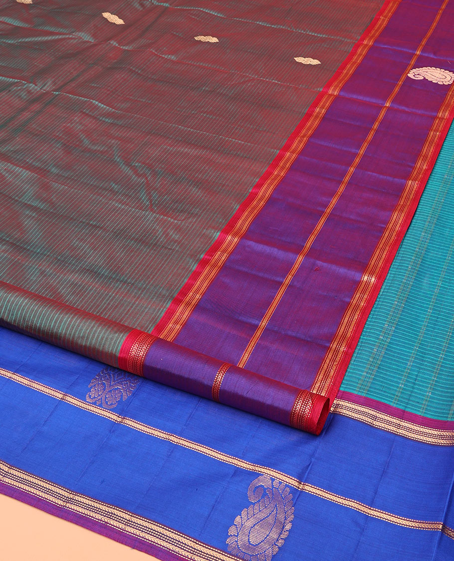 Blue Kanchipuram Silk Saree, Accentuated with Zari Buttas and Vazhaipoo Stripes on Its Body, Complemented by a Contrast Border of Muthu, Kathir, and Arumbu Manga Designs, Pallu of Zari Designs, and Paired with a Contrast Blouse