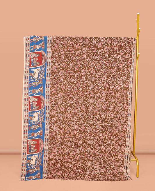 Brown Machine-Printed Kalamkari Cotton Saree, Decked Up with Floral Motifs on Its Body, Complemented by a Contrast Village-Theme Printed Border, Pallu of Peacock Motifs Print, and Paired with a Printed Blouse