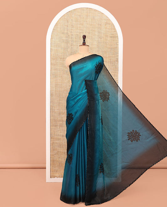 Blue Designer Saree, Accentuated with Floral Print and Outline Stone Work All Over Its Body, Scallop Embroidered Border, and Paired with a Matching Blouse