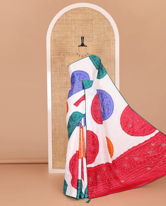 White base multi-color bandhani dots enclosed circle printed with mirror work moss chiffon saree, contrast piping border, pallu of print, stone work and mirror work