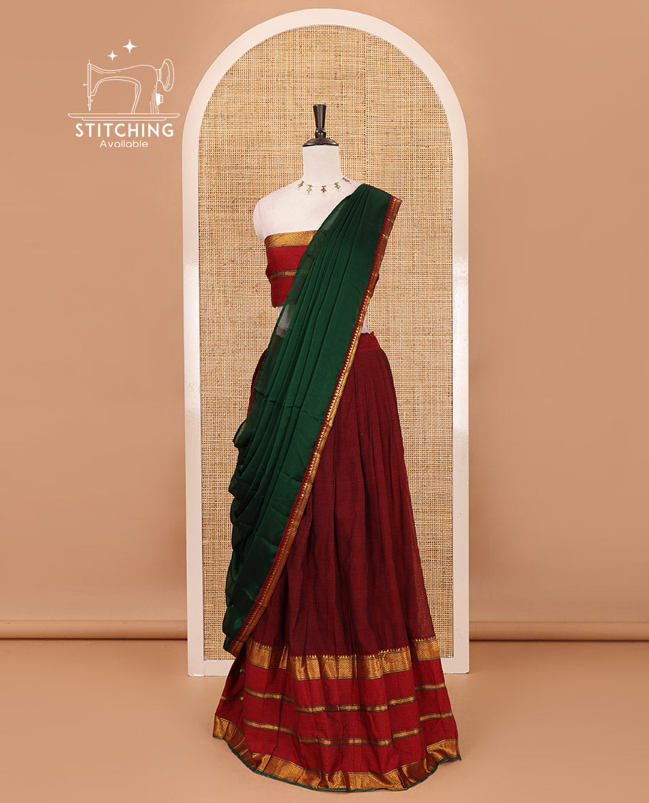 Maroon-green mercerised cotton half-saree, plain & contrast traditional zari big border skirt, traditional motifs matching blouse & contrast Syska georgette dhavani