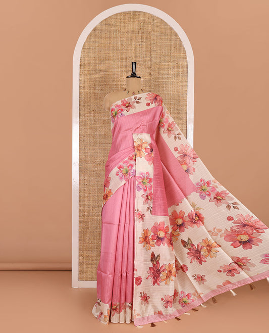 Pink plain fancy tussar digital printed saree, contrast floral digital printed border, floral printed pallu, and a floral printed blouse