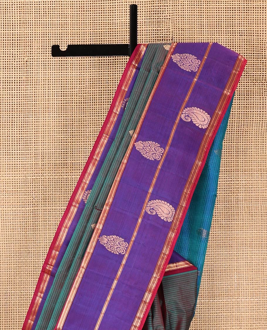 Blue Kanchipuram Silk Saree, Accentuated with Zari Buttas and Vazhaipoo Stripes on Its Body, Complemented by a Contrast Border of Muthu, Kathir, and Arumbu Manga Designs, Pallu of Zari Designs, and Paired with a Contrast Blouse