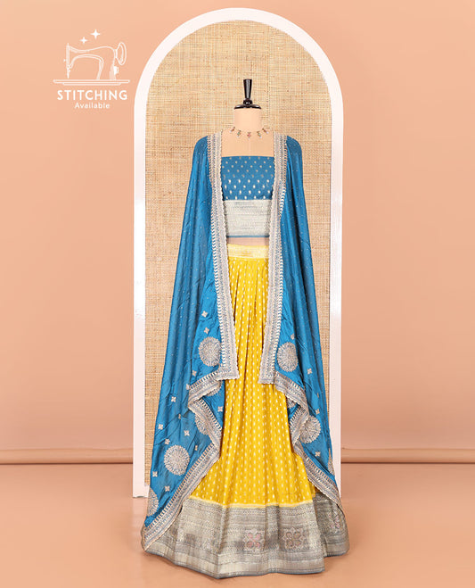 Mustard Buttas Embroidered Half-Saree with Contrast Traditional Motifs, Embroidered Viscose Georgette Border, Contrast Blouse, Intricately Embroidered Syska Georgette Dhavani, and a Embroidered Belt
