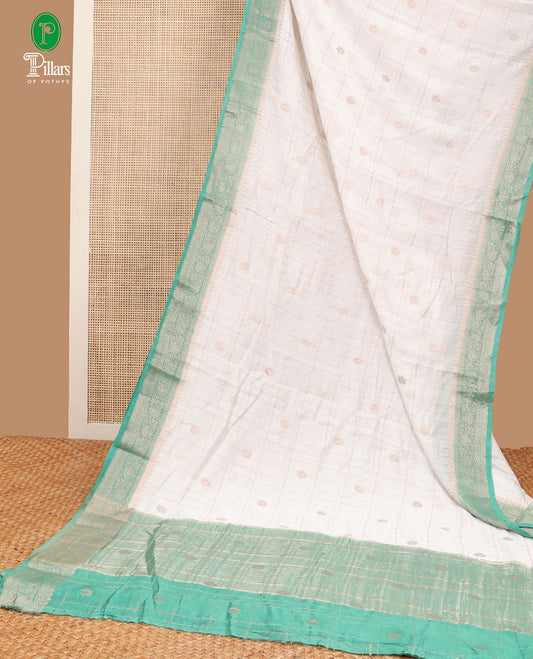 Aqua green zari checks dola viscose saree with contrast border & chit pallu along with zari checks, butta design blouse