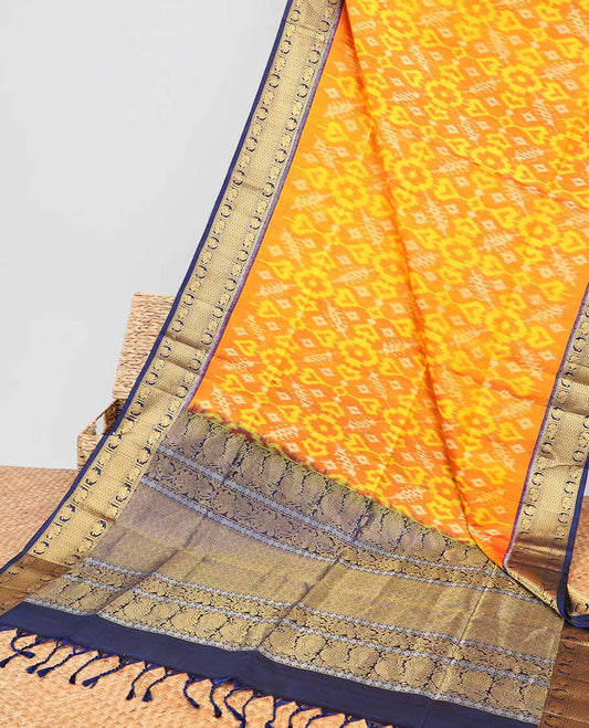 Orange ikkat style floral design soft silk saree with contrast zari border & intricate floral zari design pallu