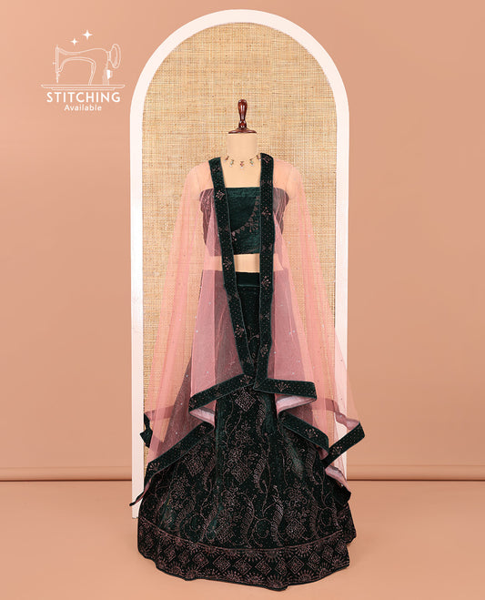 Green Velvet Half-Saree Features Swarovski Stonework Skirt, Matching Stonework Blouse, Contrast Net Dhavani