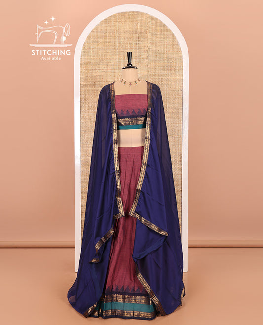 Dark Onion Pink-Navy Blue Chettinad Cotton Half-Saree Featuring a Plain Skirt, Highlighted with a Contrast Traditional Zari Rettai Pettu Temple Border, a Subtly Woven Matching Blouse, and a Vichitra Silk Contrast Traditional Zari-Bordered Dhavani