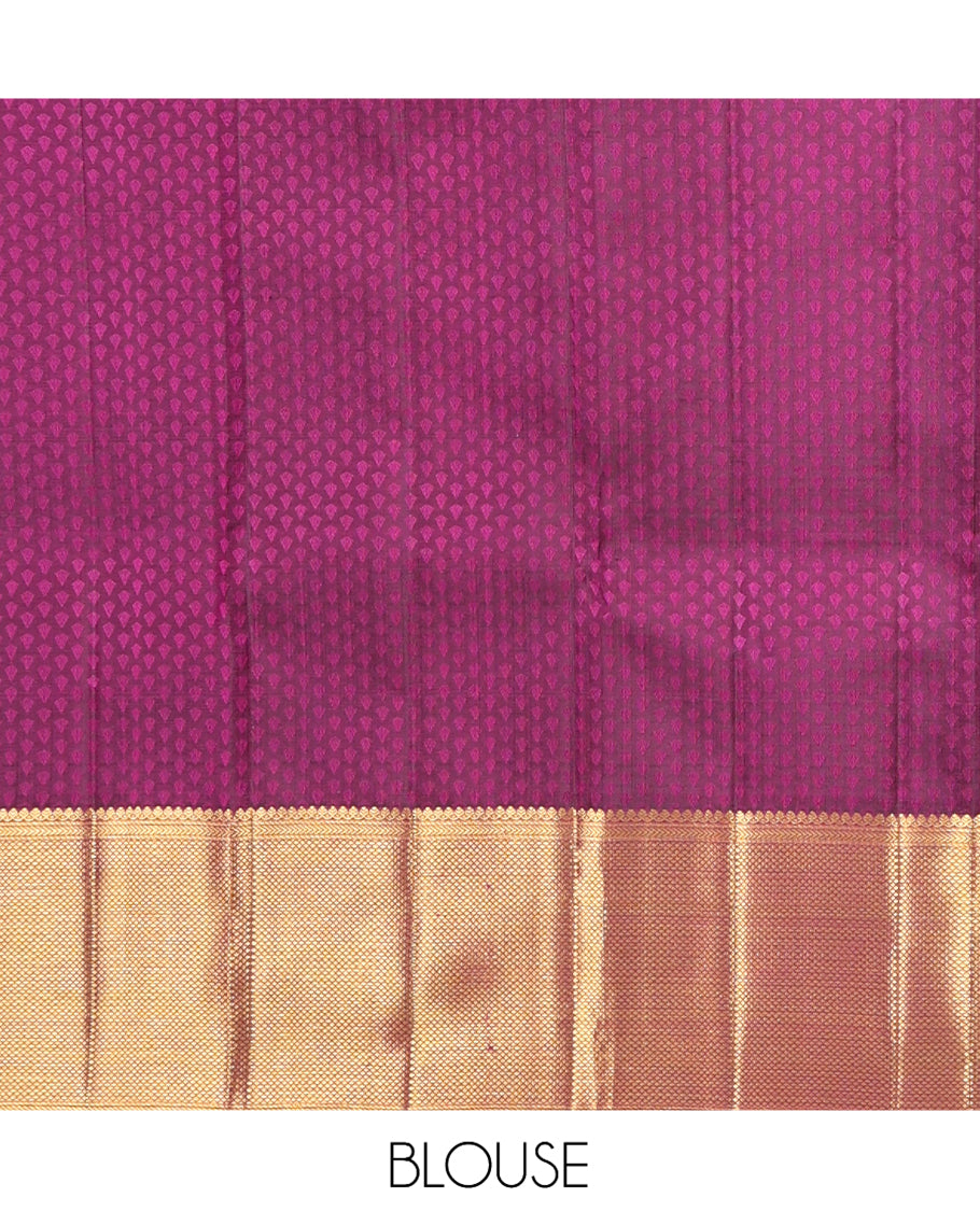 Purple Embossed Parambara Silk Saree, Accentuated with Thazampoo Rekku Buttas, a Zari Border of Thilakam Mokku, Kathir, and Kuyil Kann Designs, Pallu of Floral Design, and Matching Blouse