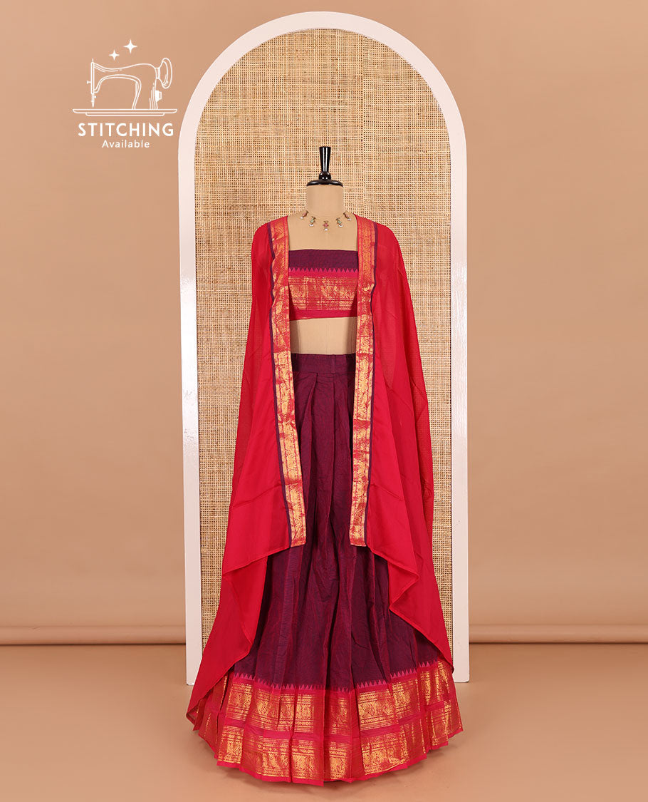 Magenta-pink sungudi cotton half-saree, plain with contrast traditional zari varisai pettu bordered skirt, a matching blouse, and a zari bordered dhavani