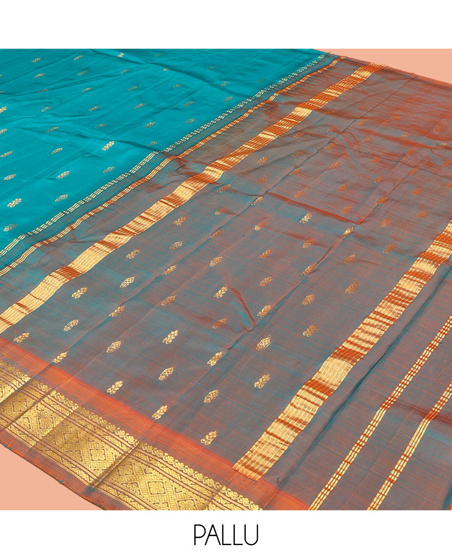 Blue Kanchipuram Silk Saree, Adorned with Zari Buttas, a Contrast One-Sided Zari Border, Zari Striped Pallu, and No Blouse