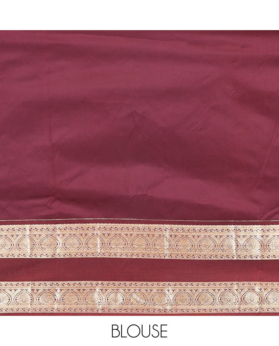 Orange and Brown Budget Silk Saree, Adorned with Zari Buttas All Over Its Body, Complemented by Contrast Rettai Pettu Traditional Zari Border of Jada Nagam, Pallu Steeped with Paisleys, and Paired with a Contrast Blouse