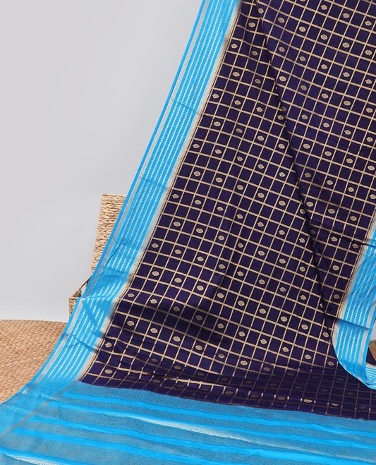 Violet floral motifs enclosed with checked mysore silk saree with contrast striped zari border & pallu of intricate design