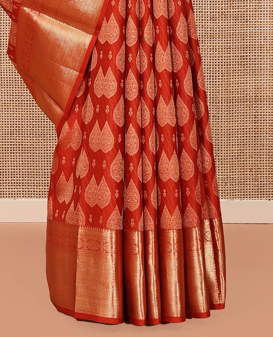 Rust Kanchipuram Wedding Silk Saree, Steeped with Zari Buttas All Over Its Body, Highlighted by Zari Border of Chakram and Vanki Designs, Grand Jaal Pallu and Paired with a Matching Blouse
