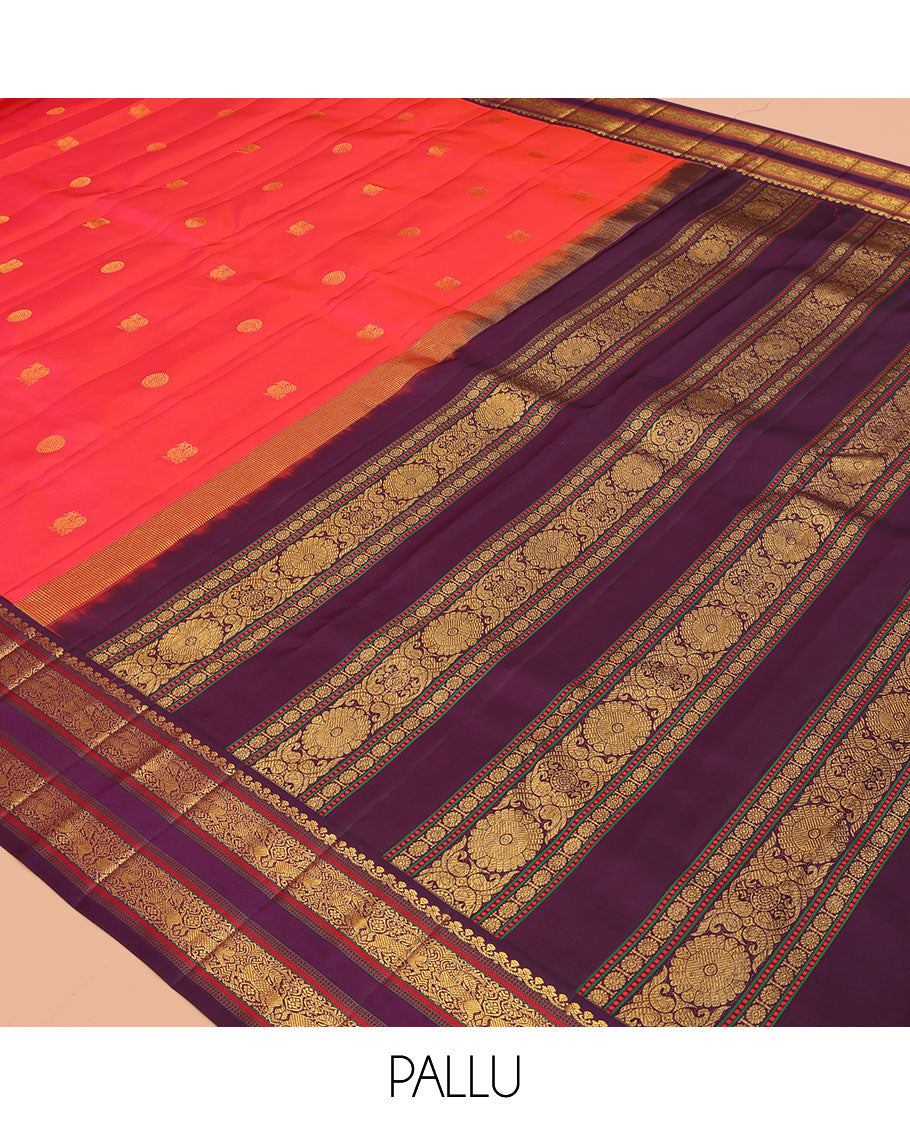Orange Kanchipuram Silk Saree, Graced with Mayil-Chakram Buttas, a Contrast Korvai Rettai Pettu Border of Muthu, Muthu, and Kuthirai Designs, Traditional Pallu, and a Contrast Blouse