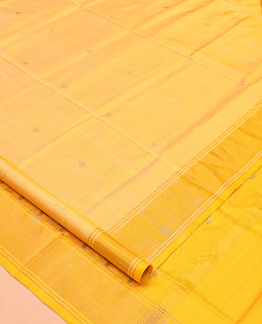 Yellow Uppada Silk Saree, Subtly Sparkled with Buttas, a Contrast Zari Border, Pallu of Mughal-Style Jaal Designs, and a Contrast Blouse