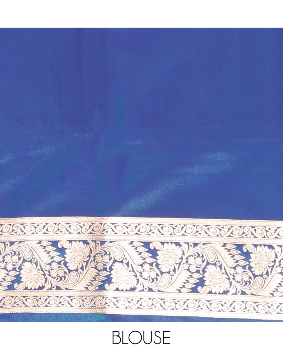 Blue Banarasi Nylon Saree, Majestically Detailed with Zari Buttas, Highlighted by a Floral Creeper Zari Border, Intricate Pallu, and a Matching Blouse