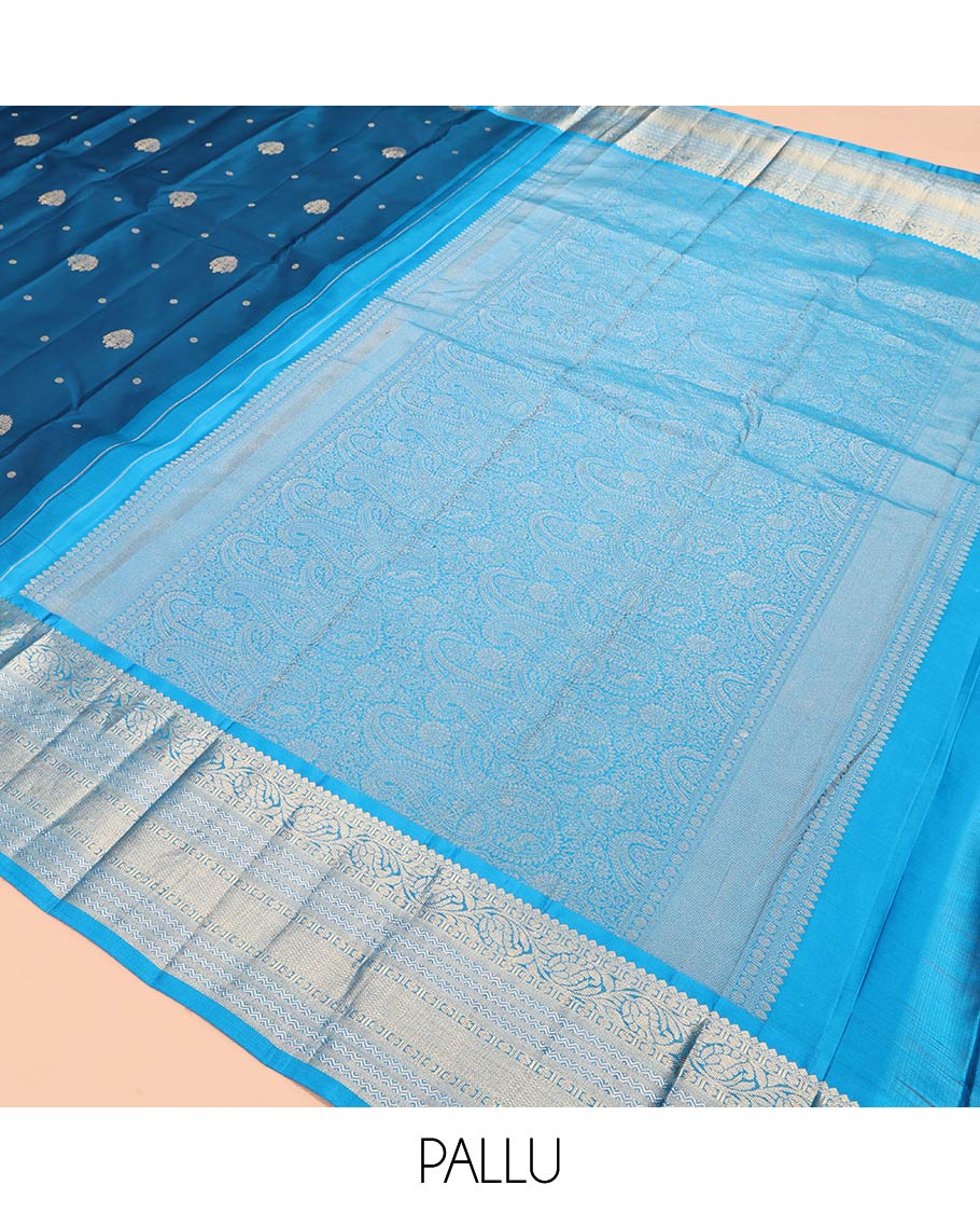 Blue Vasundhara Silk Saree, Decorated with Zari Buttas, Contrast Rettai Pettu Border of Thilakam Mokku, Kodi Visiry, Neli, and Mayil Kann Designs, Grand Pallu, and Contrast Blouse