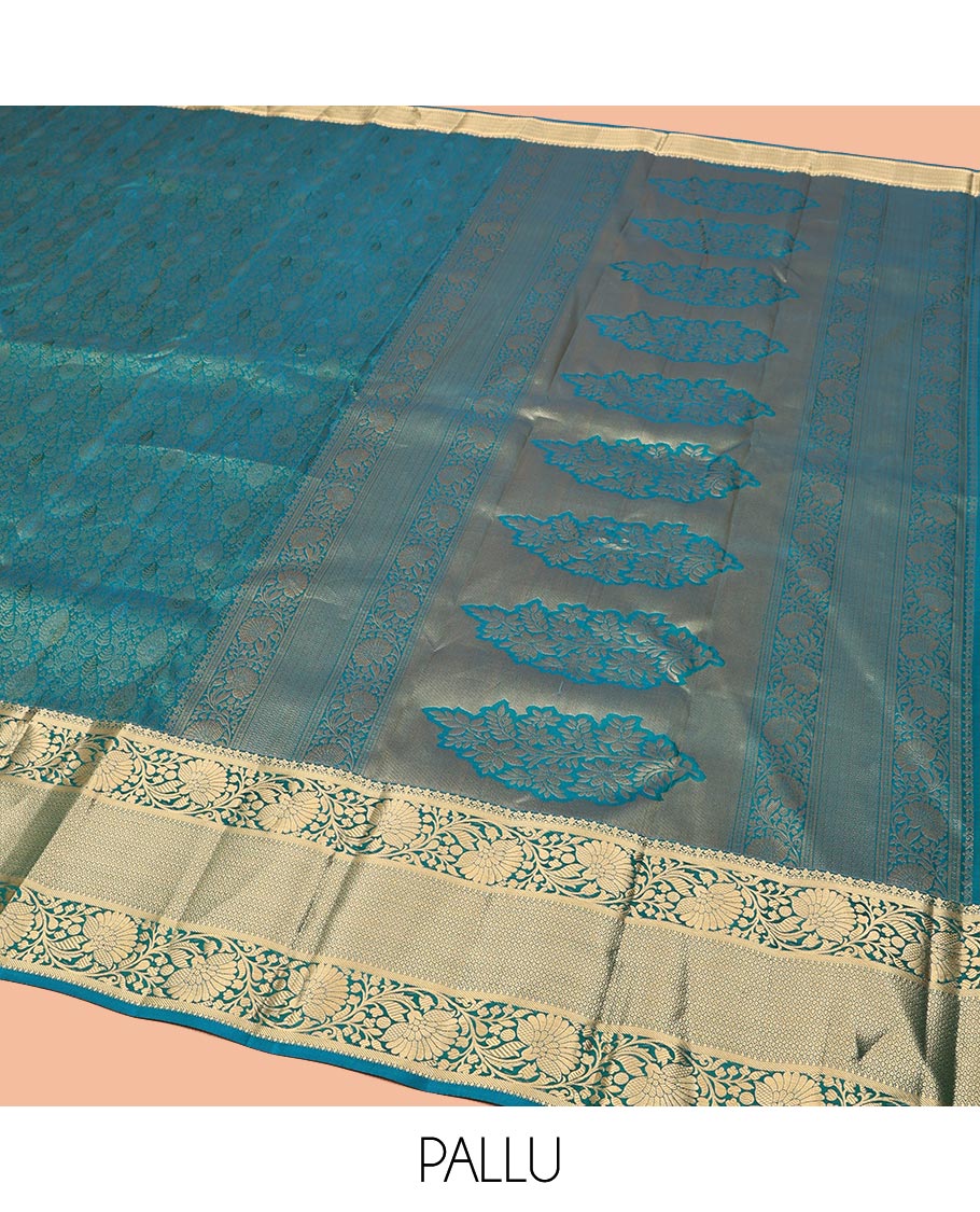 Blue Kanchipuram Wedding Silk Saree, Ornamented with Jacquard Designs on Its Body, Highlighted by a Zari Border of Kodi Visiry and Then Kuli Kann Designs, Pallu of Floral Designs, and Paired with a Matching Blouse