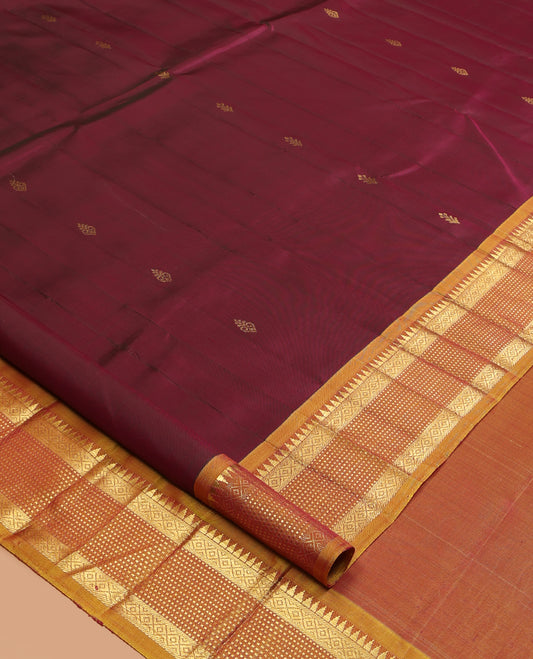 Maroon Kanchipuram Silk Saree, Graced with Zari Buttas,  a Contrast One-Sided Border of Rekku, Banaras, Muthu, and Mayil Kann Design, Zari Design Pallu, and No Blouse