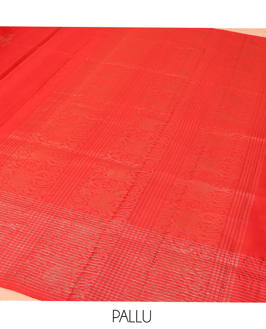 Red Mayuri Soft Silk Saree, Spotlighted with Maan Buttas All Over Its Body, Sparkling Zari Border of Checks and Maan Buttas, Sparsely Woven Pallu, and Paired with a Matching Blouse