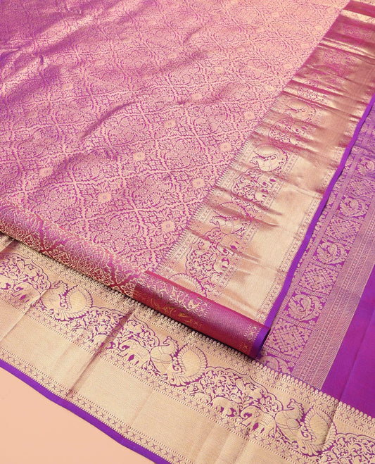 Pink Kanchipuram Wedding Silk Saree, Graced with Jacquard Design, a Zari Border of Thilakam Mokku, Muthu, Rudraksham, Yaanai and Mayil, Grand Pallu, and a Matching Blouse