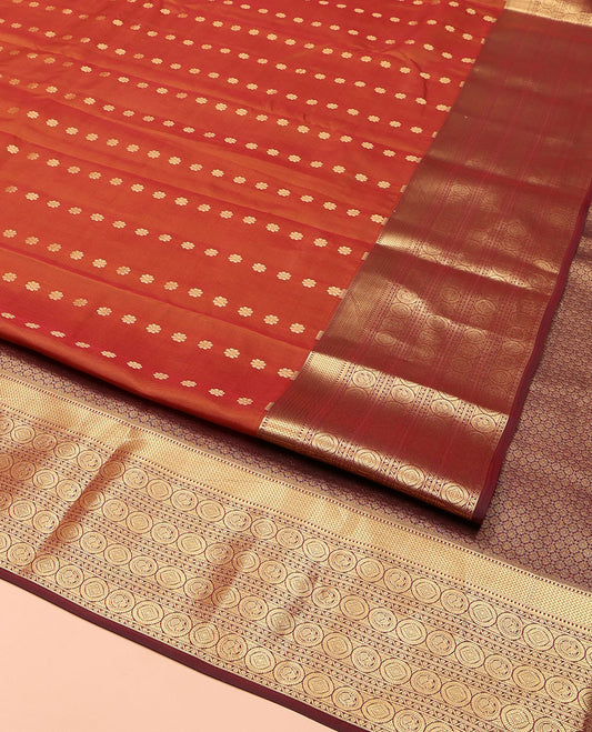 Rust Vasundhara Lite Silk Mix Saree, Elegantly Highlighted with a Kamalam Buttas on Its Body, Complemented by a Contrast Border of Muthu, Vanki, Round Mayil, and Chakram Designs, Gracefully Embellished Pallu, and Paired with a Contrast Blouse