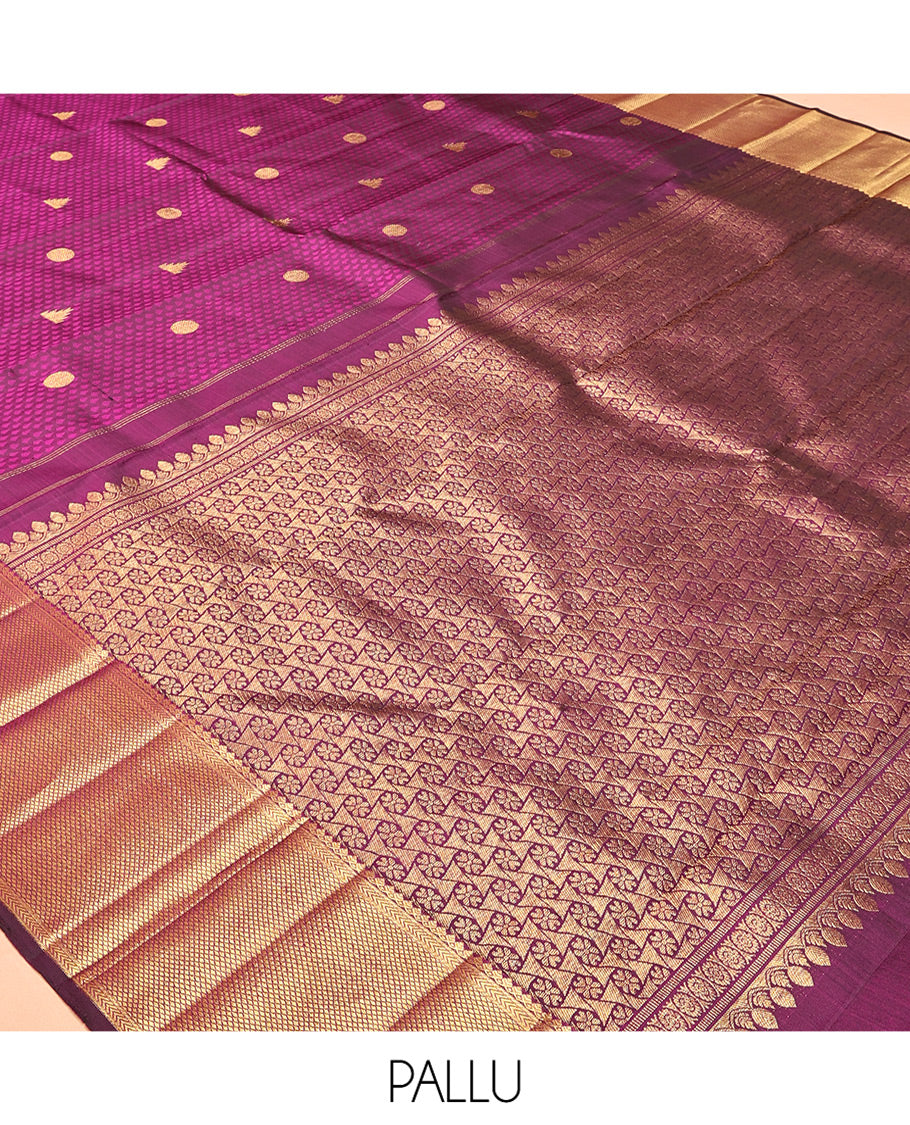 Purple Embossed Parambara Silk Saree, Accentuated with Thazampoo Rekku Buttas, a Zari Border of Thilakam Mokku, Kathir, and Kuyil Kann Designs, Pallu of Floral Design, and Matching Blouse
