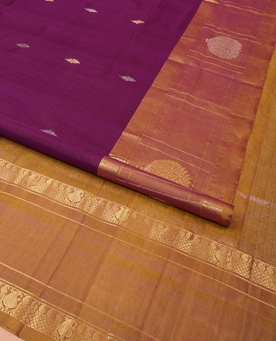 Purple Uppada Silk Saree Embellished with Zari Buttas, Complemented by a Contrast Traditional Zari Border of Zari Designs, Contrast Pallu of Floral and Paisley Designs, and Paired with a Contrast Blouse