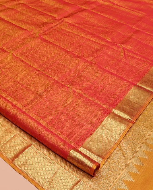 Red Parampara Silk Saree, Subtly Sparkled With Geometric Embossed Patterns in Its Body, Highlighted by Contrast Jaal Design Zari Border, Pallu of Mayil Kann and Yaali Designs , and Paired with a Contrast Blouse