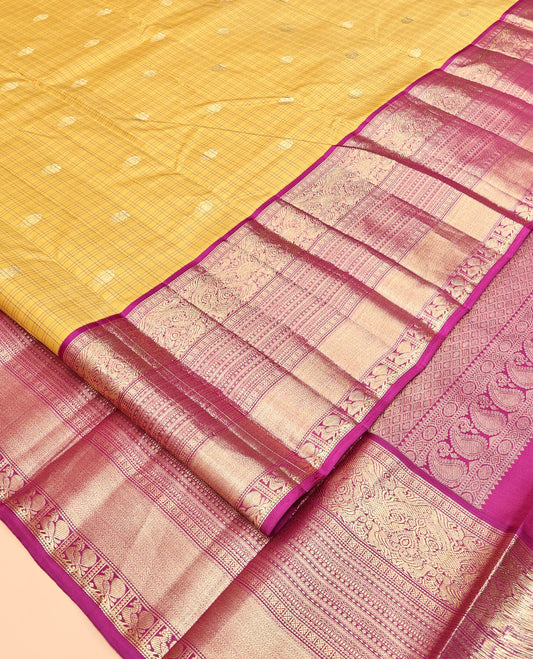 Yellow Vasundhara Silk Saree, Sparsely Sparkled with Zari Buttas and Checks, Complemented by a Contrast Border of Lavangam, Muthu, Kathir, Neli, and Mayil, Jaal Pallu, and a Contrast Blouse