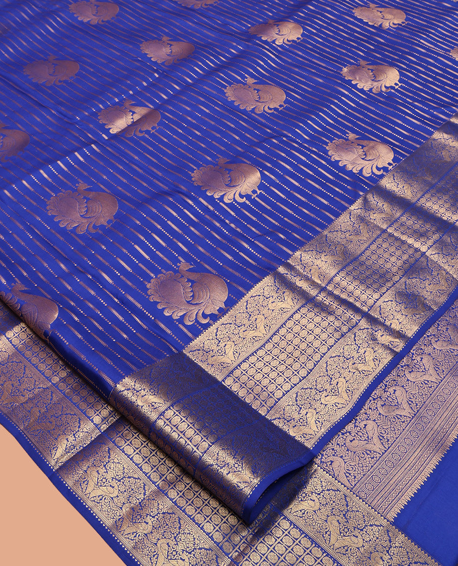 Blue Vasundhara Lite-Silk Mix Saree Featuring Zari Buttas and Stripes, Highlighted by Zari Border of Kamalam and Kili Designs, Butta-Enclosed Checked Pallu, and a Matching Blouse