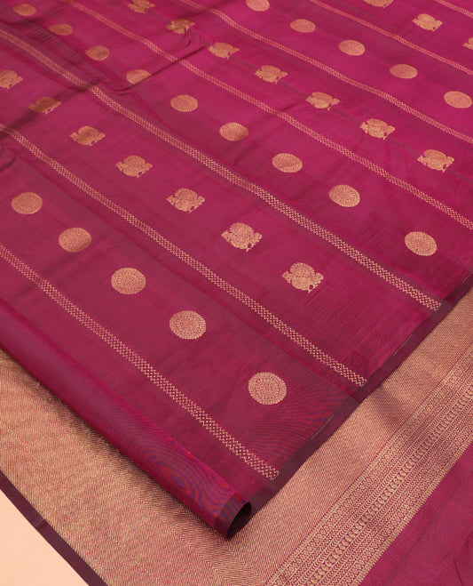 Borderless Purple Vasundhara Silk Saree, Artfully Detailed with Mayil and Chakram Buttas, Grandly Woven Pallu, and a Matching Blouse