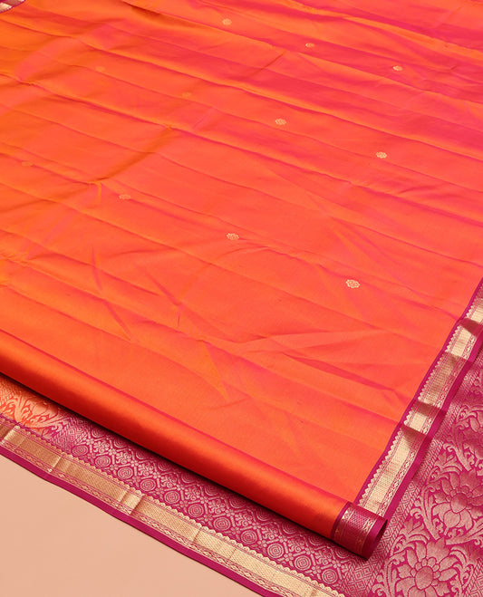Orange Vasundhara Silk Saree, Embellished with Zari Buttas, Contrast Border of Thilakam Mokku, Vanki, and Diamond Designs, Grand Pallu, and a Contrast Blouse