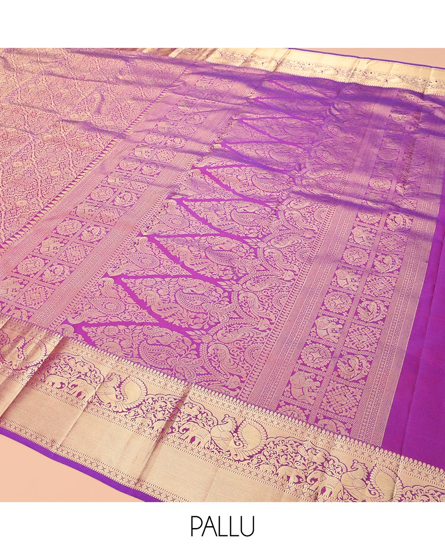 Pink Kanchipuram Wedding Silk Saree, Graced with Jacquard Design, a Zari Border of Thilakam Mokku, Muthu, Rudraksham, Yaanai and Mayil, Grand Pallu, and a Matching Blouse