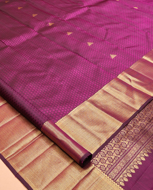 Purple Embossed Parambara Silk Saree, Accentuated with Thazampoo Rekku Buttas, a Zari Border of Thilakam Mokku, Kathir, and Kuyil Kann Designs, Pallu of Floral Design, and Matching Blouse