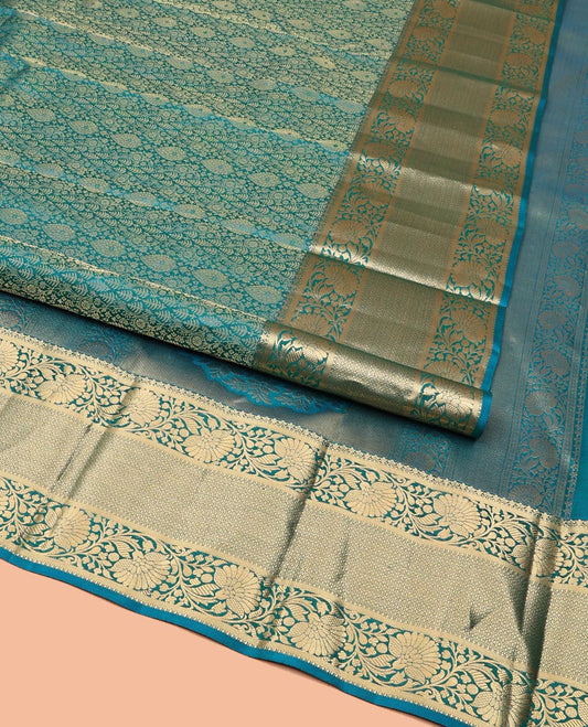 Blue Kanchipuram Wedding Silk Saree, Ornamented with Jacquard Designs on Its Body, Highlighted by a Zari Border of Kodi Visiry and Then Kuli Kann Designs, Pallu of Floral Designs, and Paired with a Matching Blouse