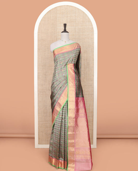Grey Gadwal Saree Decorated with Buttas and Checks, a Contrasting Border Woven with Traditional Zari Designs, the Pallu Is Complemented by Jaal Design, and a Contrast Blouse