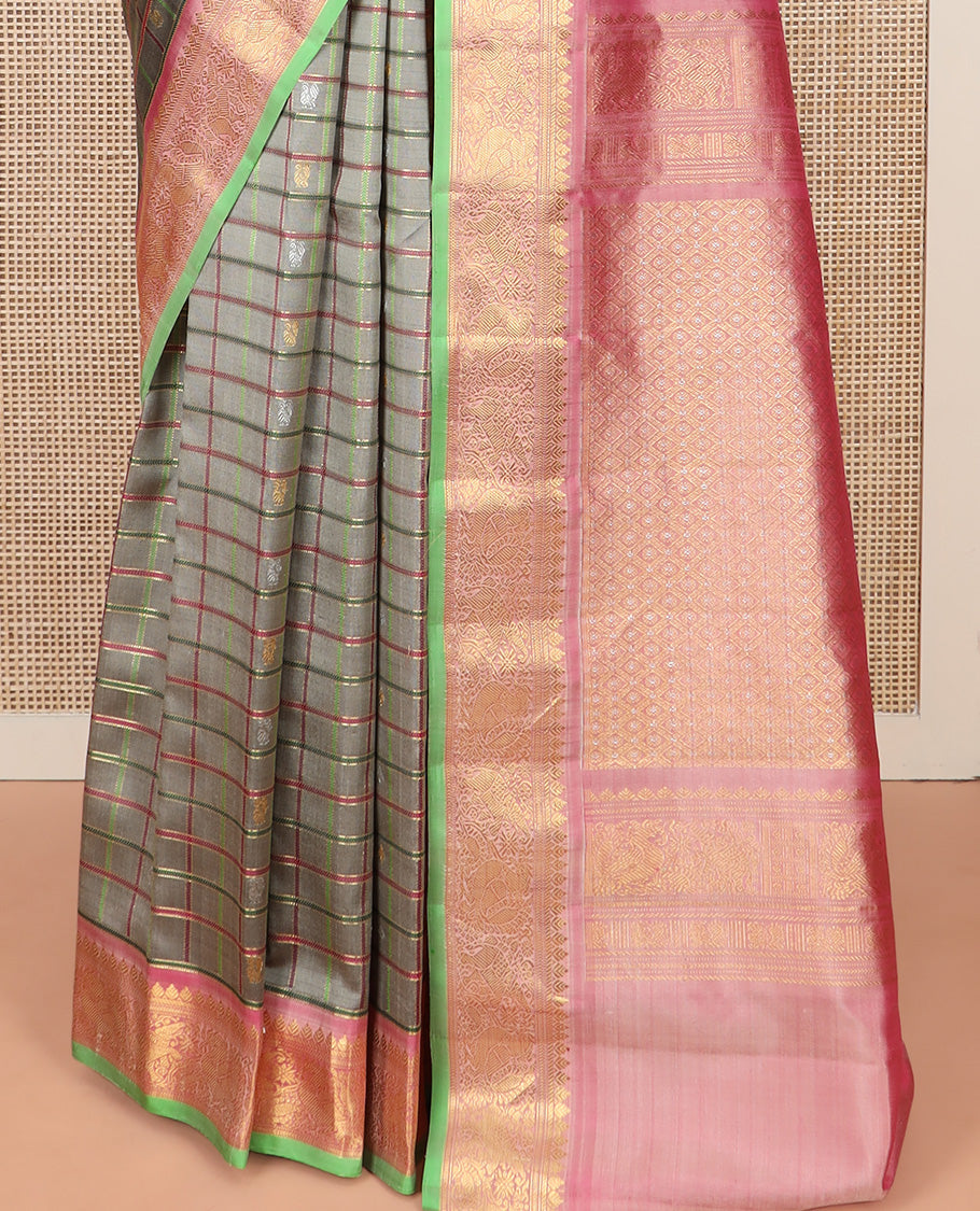 Grey Gadwal Saree Decorated with Buttas and Checks, a Contrasting Border Woven with Traditional Zari Designs, the Pallu Is Complemented by Jaal Design, and a Contrast Blouse