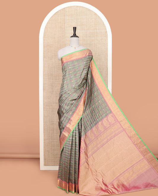 Grey Gadwal Saree Decorated with Buttas and Checks, a Contrasting Border Woven with Traditional Zari Designs, the Pallu Is Complemented by Jaal Design, and a Contrast Blouse