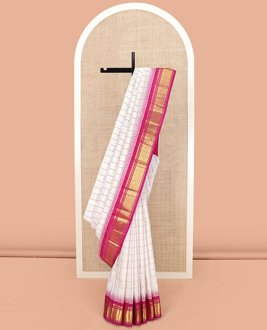 White Checked Kanchipuram Silk Saree, Complemented by a One-Sided Contrast Border Featuring Thazampoo Rekku, Thilakam Mokku, Banaras, and Jaal Designs, Pallu Steeped with Zari Designs, and Comes Without Blouse