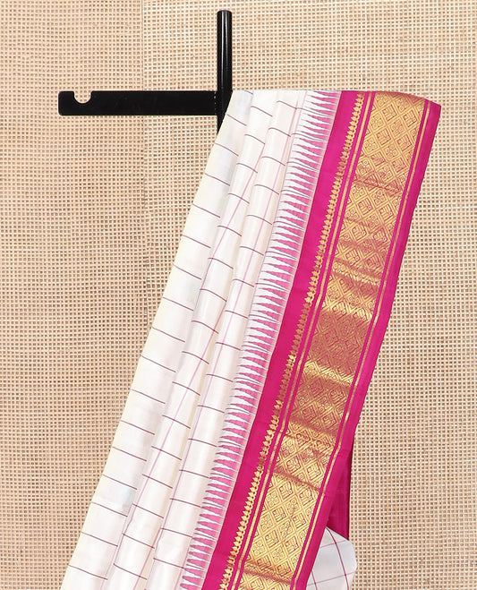 White Checked Kanchipuram Silk Saree, Complemented by a One-Sided Contrast Border Featuring Thazampoo Rekku, Thilakam Mokku, Banaras, and Jaal Designs, Pallu Steeped with Zari Designs, and Comes Without Blouse