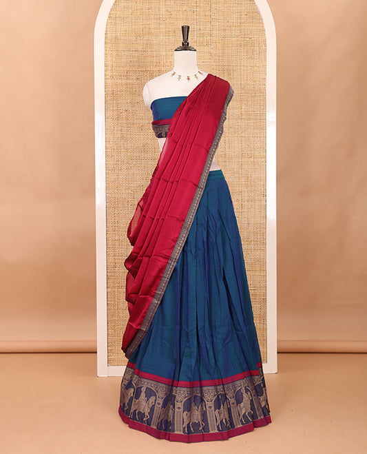 Blue with maroon mercedised cotton half-saree, contrast elephant zari border skirt, matching blouse & one side border georgette dhavani